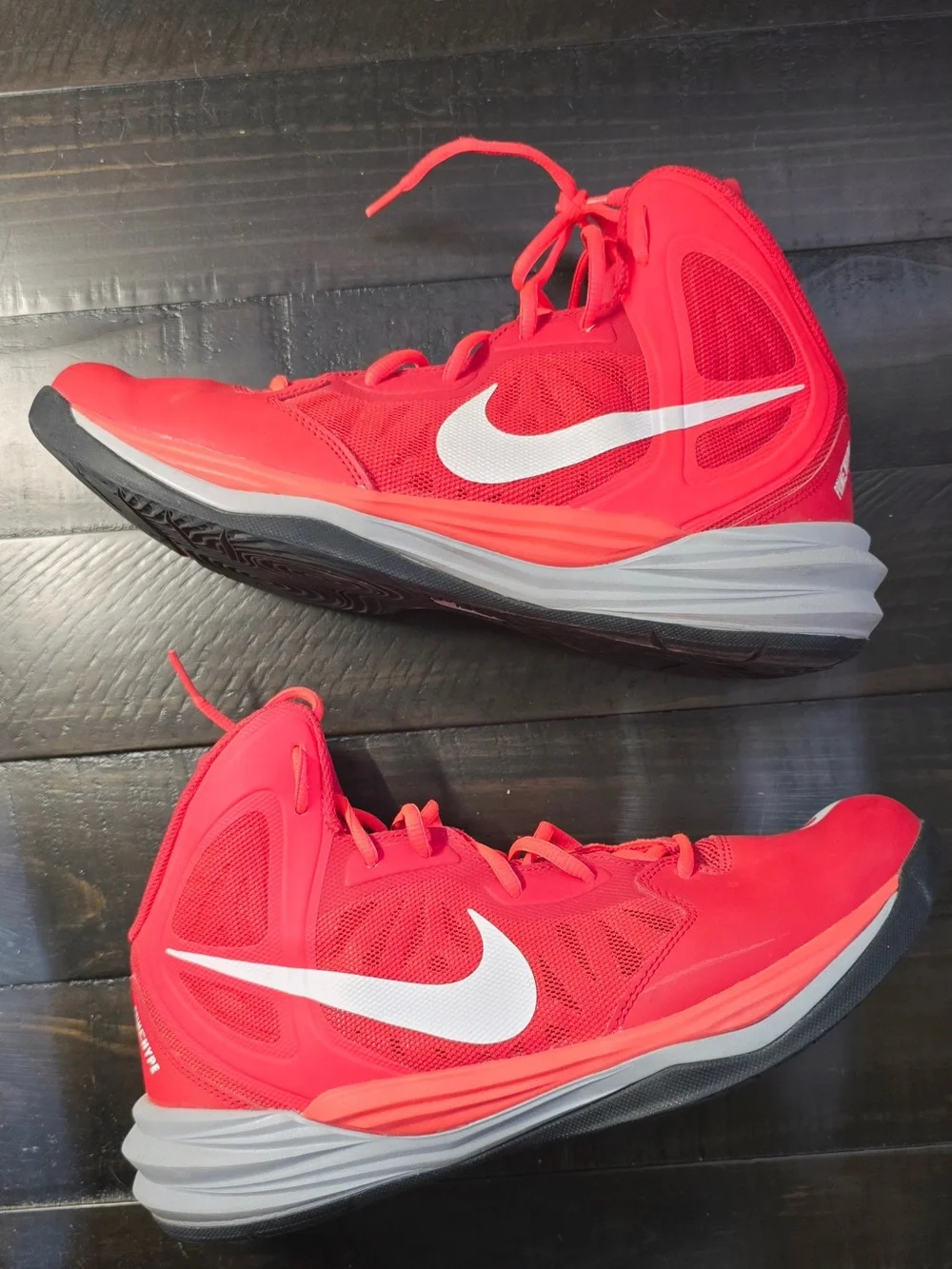 Nike Red High-Top Basketball Shoes with White Swoosh